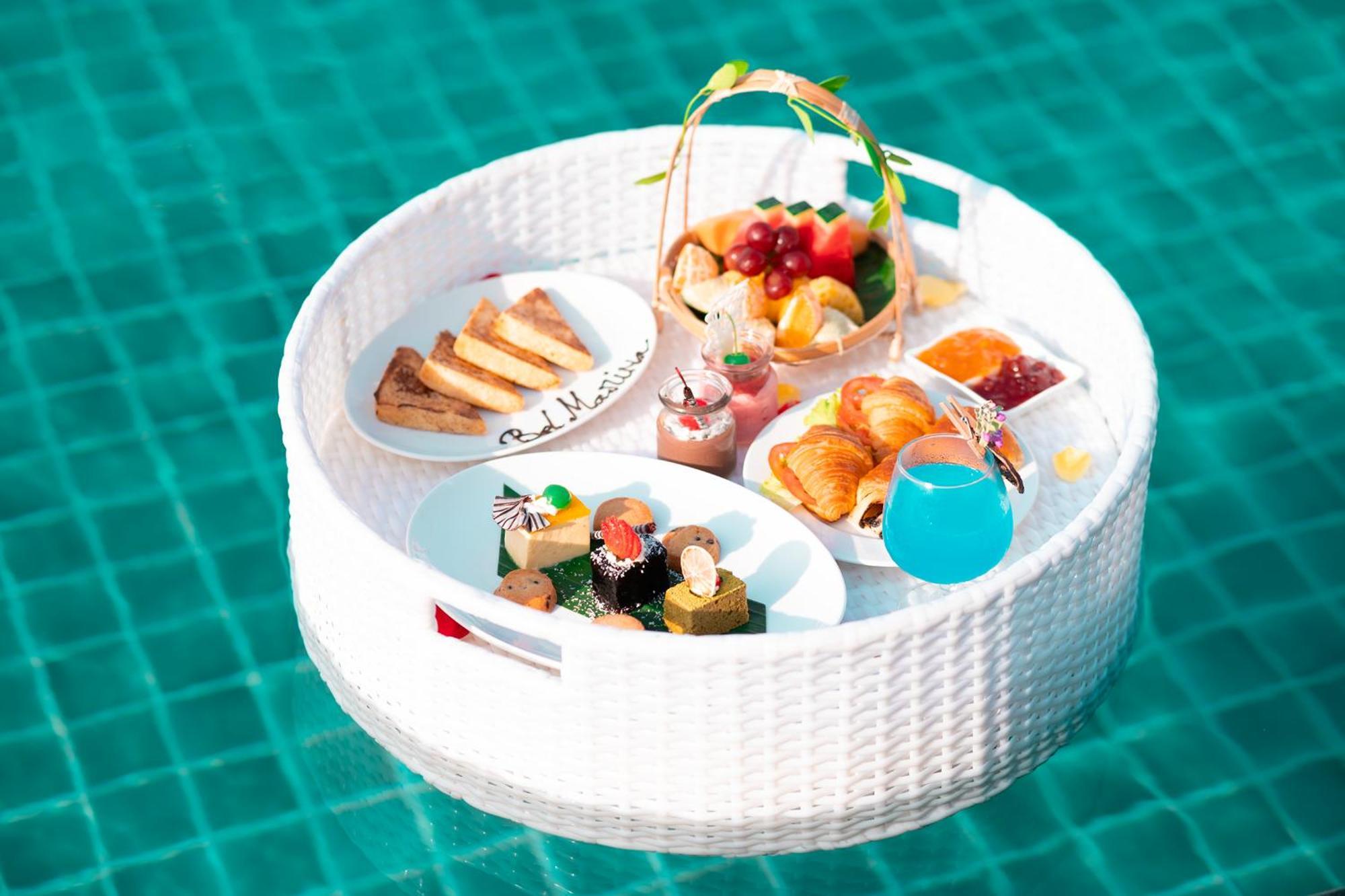 Bel Marina Hoi An Resort Esterno foto A floating breakfast tray
